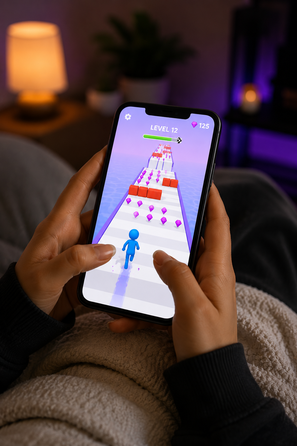 Mobile game development — player holding a smartphone running a 3D runner